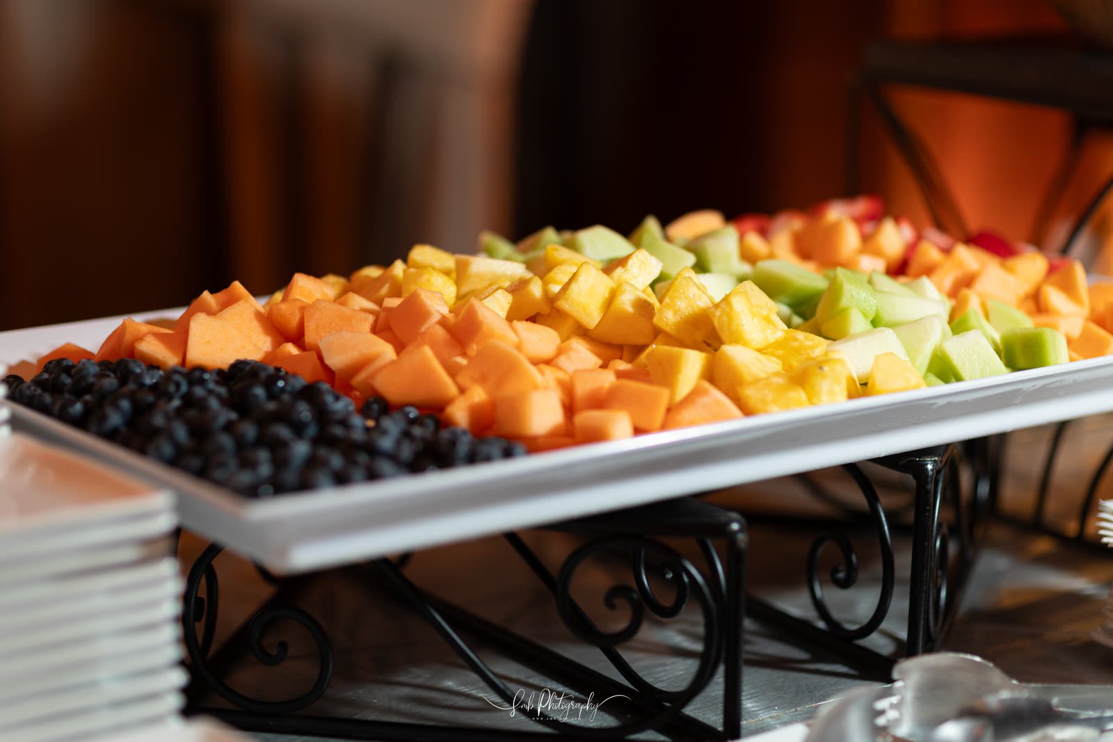 A tiered display of fresh fruit from the Tempura kitchen