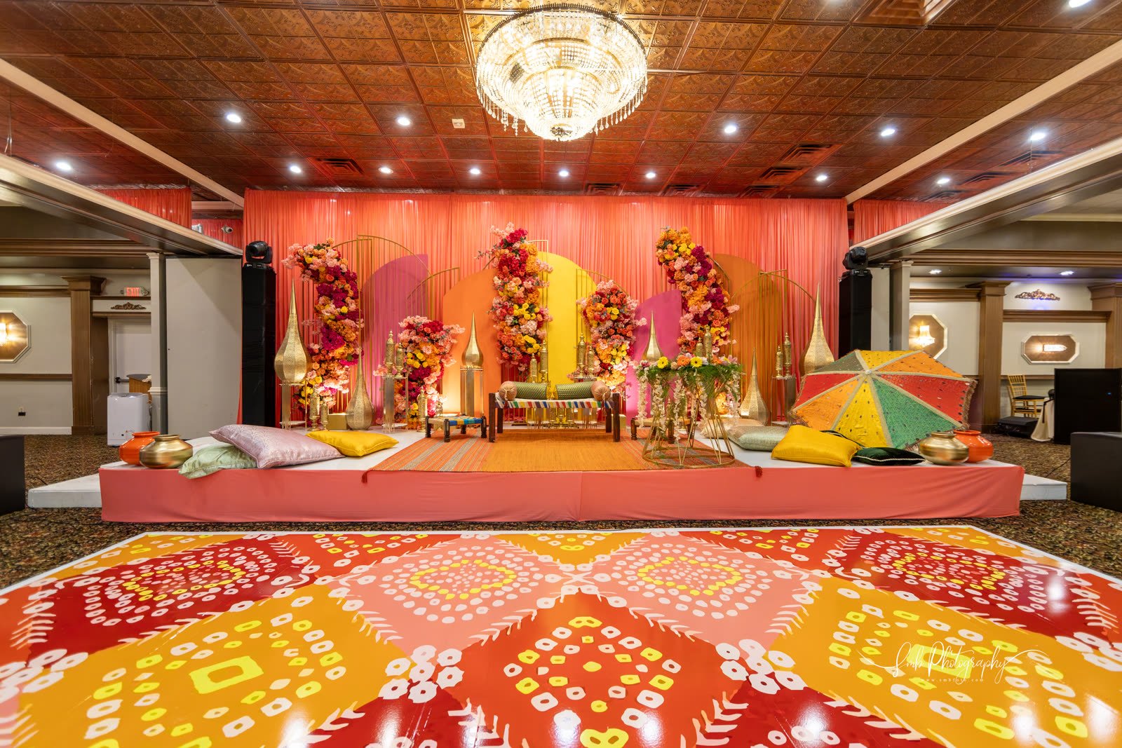 A mayoun stage in orange and pink