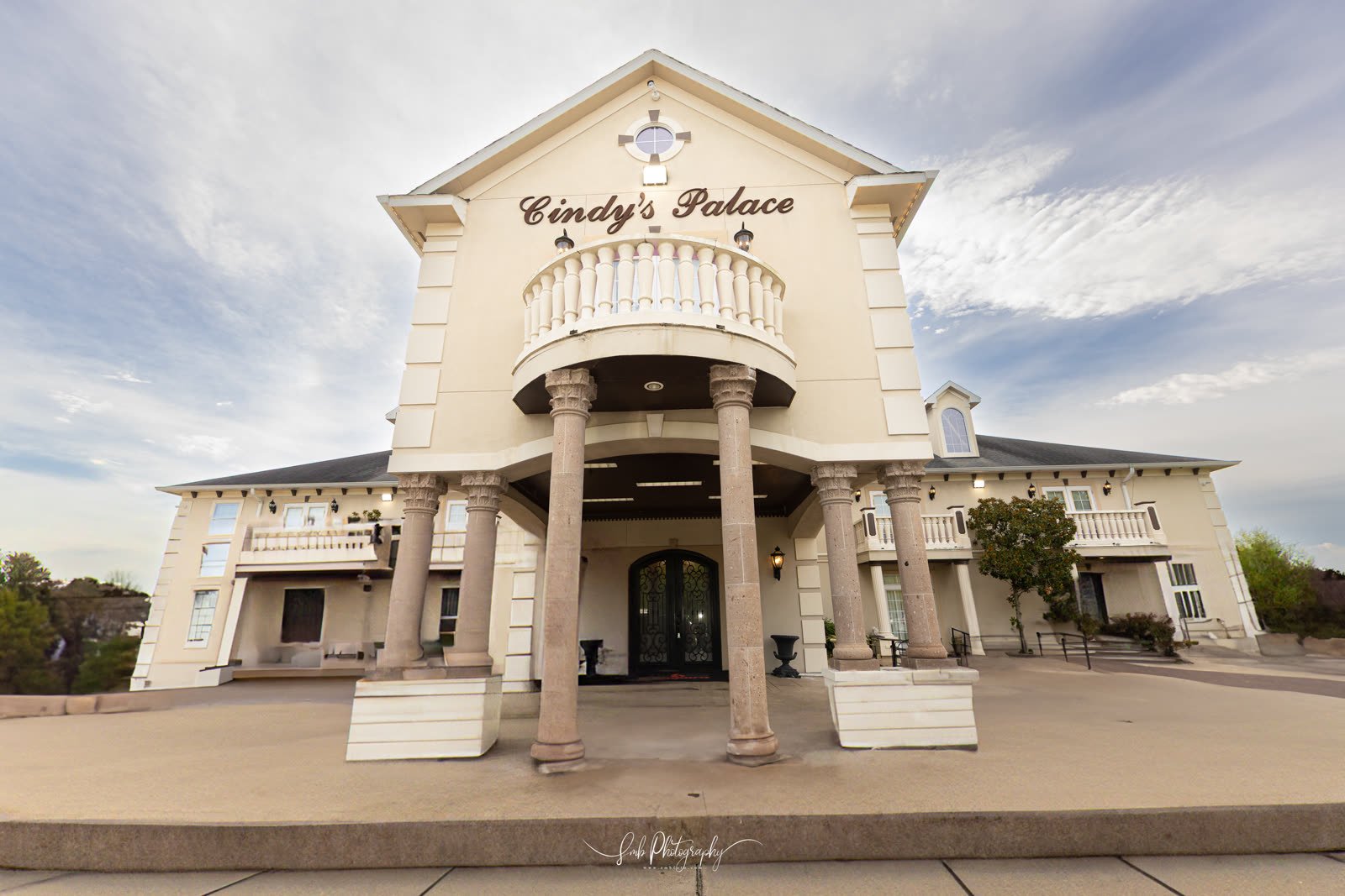 The Palace frontage and balcony in daylight