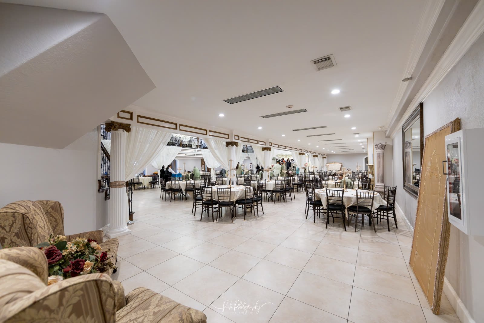 Long tables dressed for a buffet service
